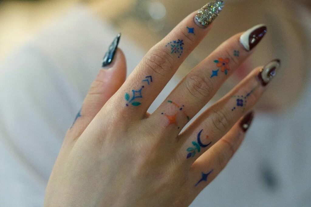 24 Latest Finger Tattoo Ideas To Try In 2024 32 Colourful Finger Tattoo Ideas For Those Who Love To Experiment