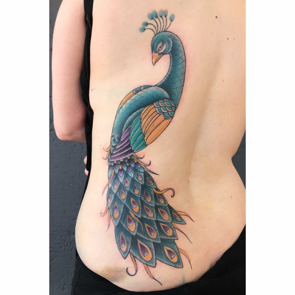12+ Peacock Tattoo On Back Ideas To Inspire You! 13 Colourful Peacock Tattoo On Back