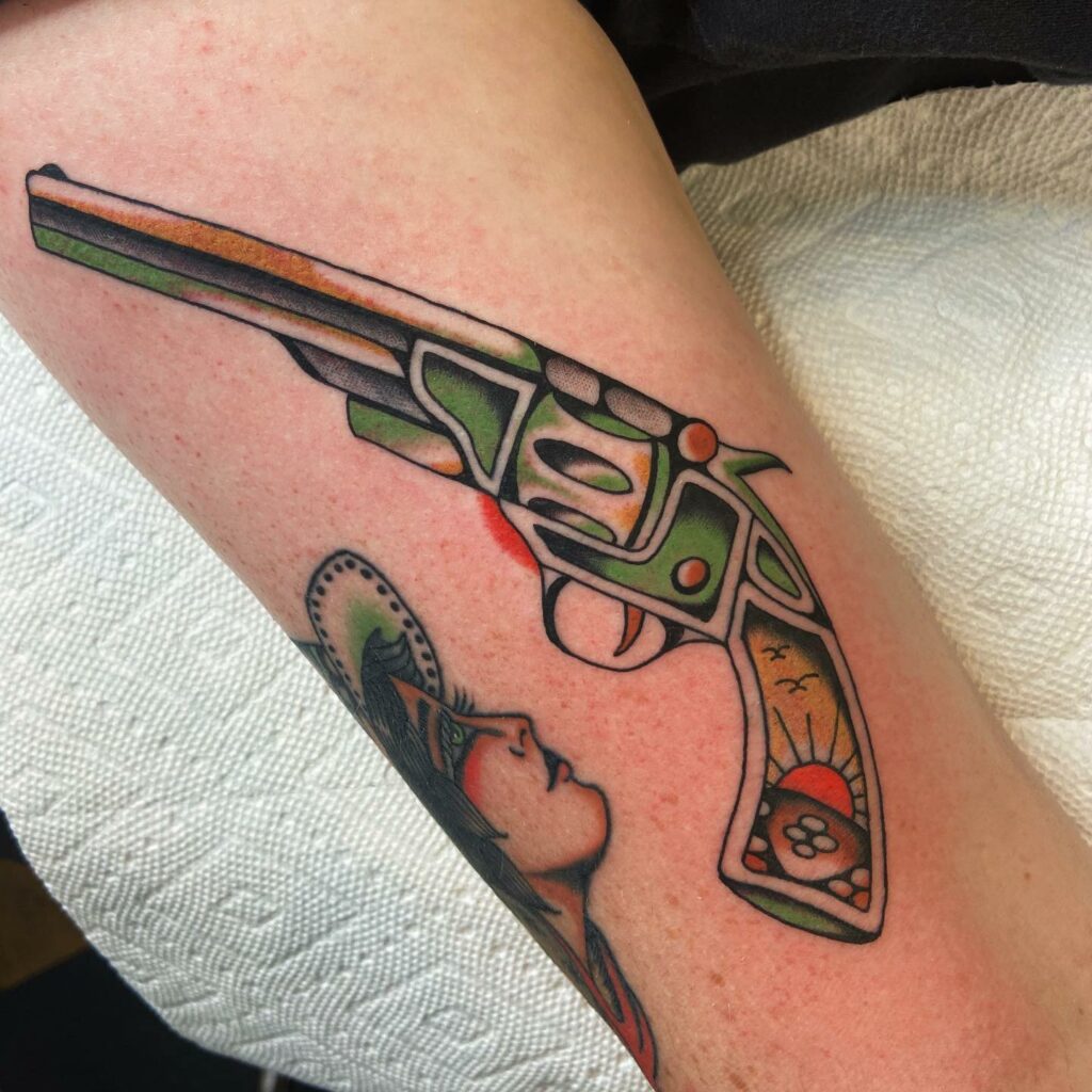 10+ Small Western Tattoo Ideas That Will Blow Your Mind! 18 Colourful Western Gun Tattoo Design