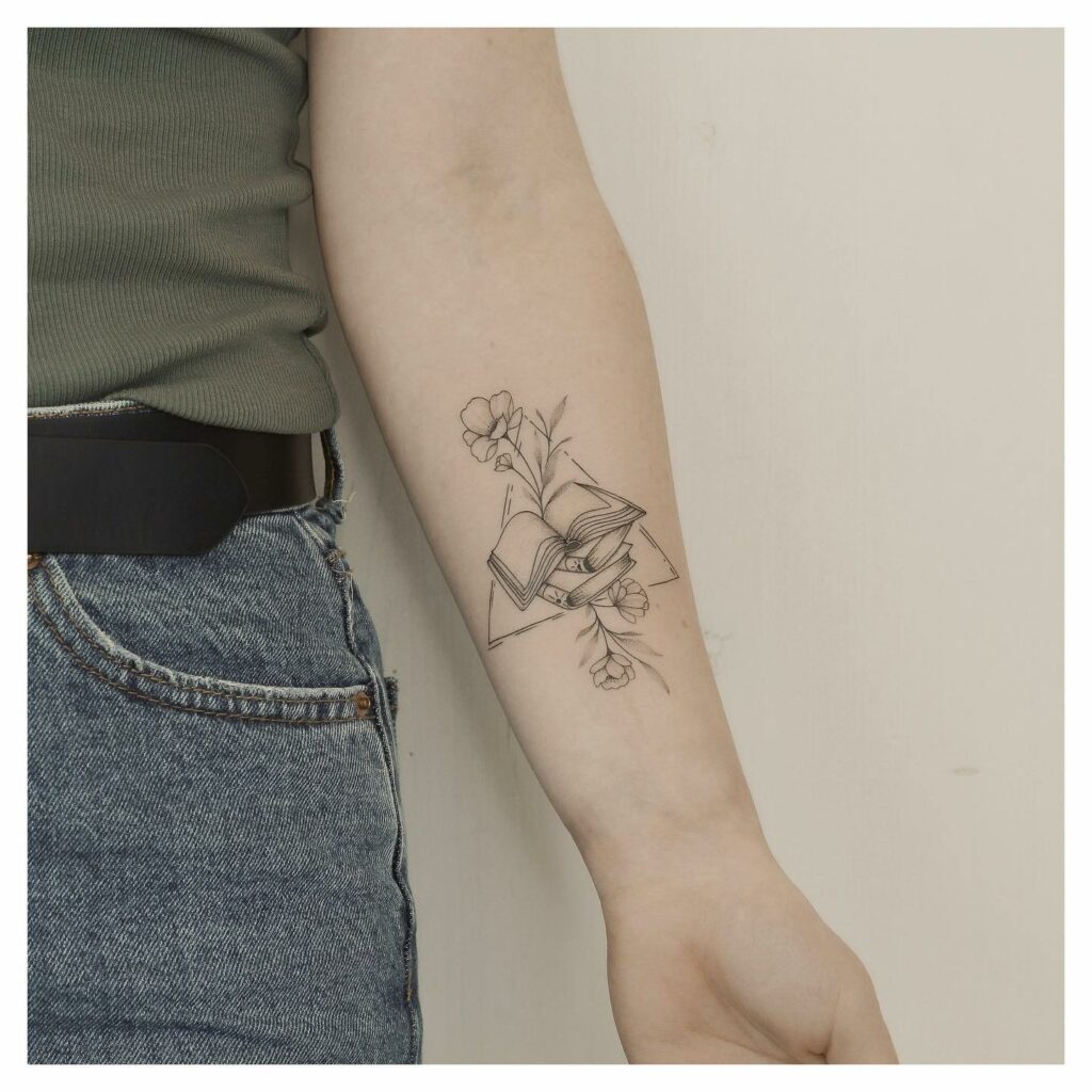 11+ Traditional Tattoo Flowers Ideas That Will Blow Your Mind! 18 Combination Of Books And Flower Tattoos