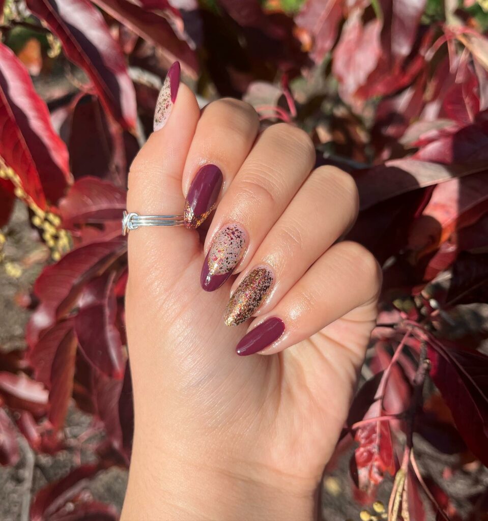 27 Latest Maroon Nail Designs To Try In 2024! 24 Confetti Almond Maroon Nails