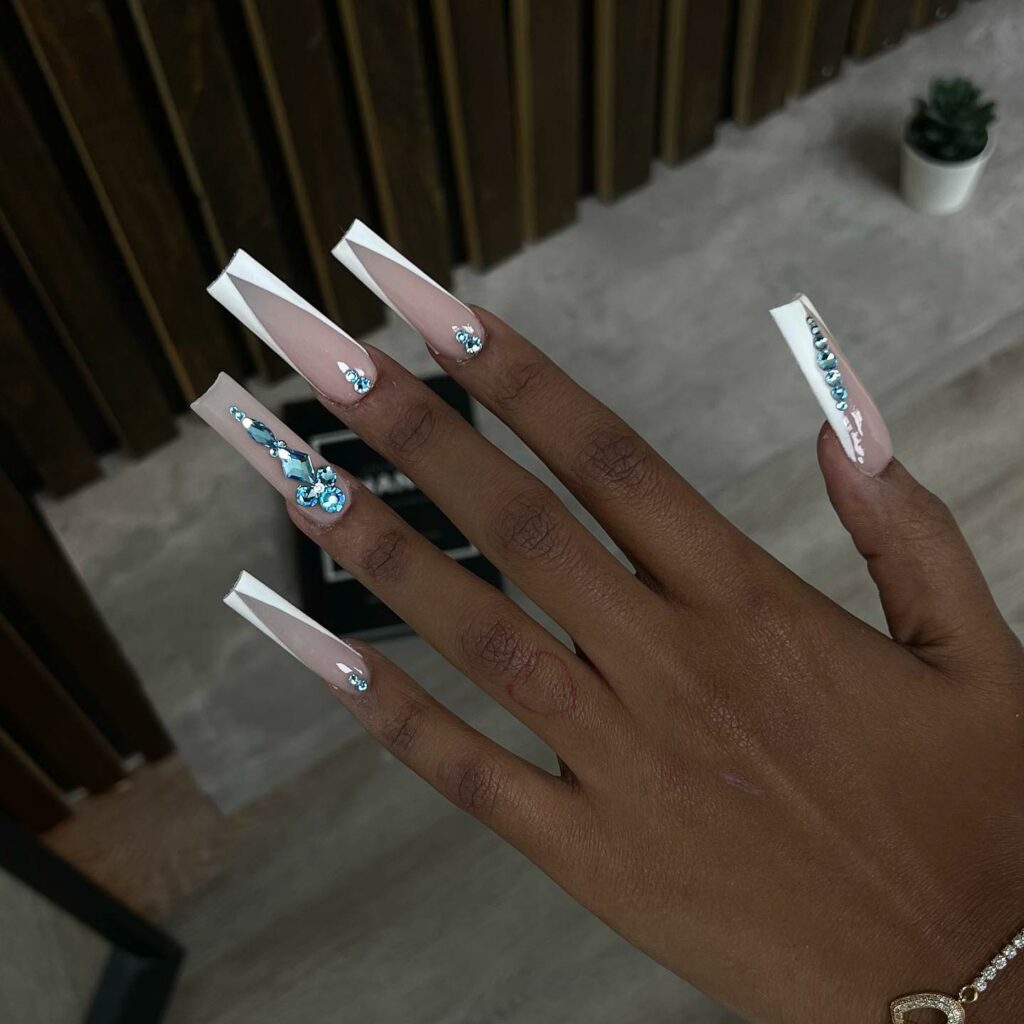 29 Latest Long Square Acrylic Nail Designs To Try In 2024! 32 Fading Pink Hues Enhanced by Aquamarine Gems