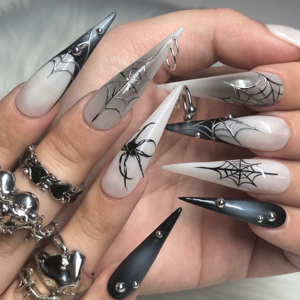 Get Spooky with 33 Black Halloween Nails To Try in 2024 30 Creepy web nails