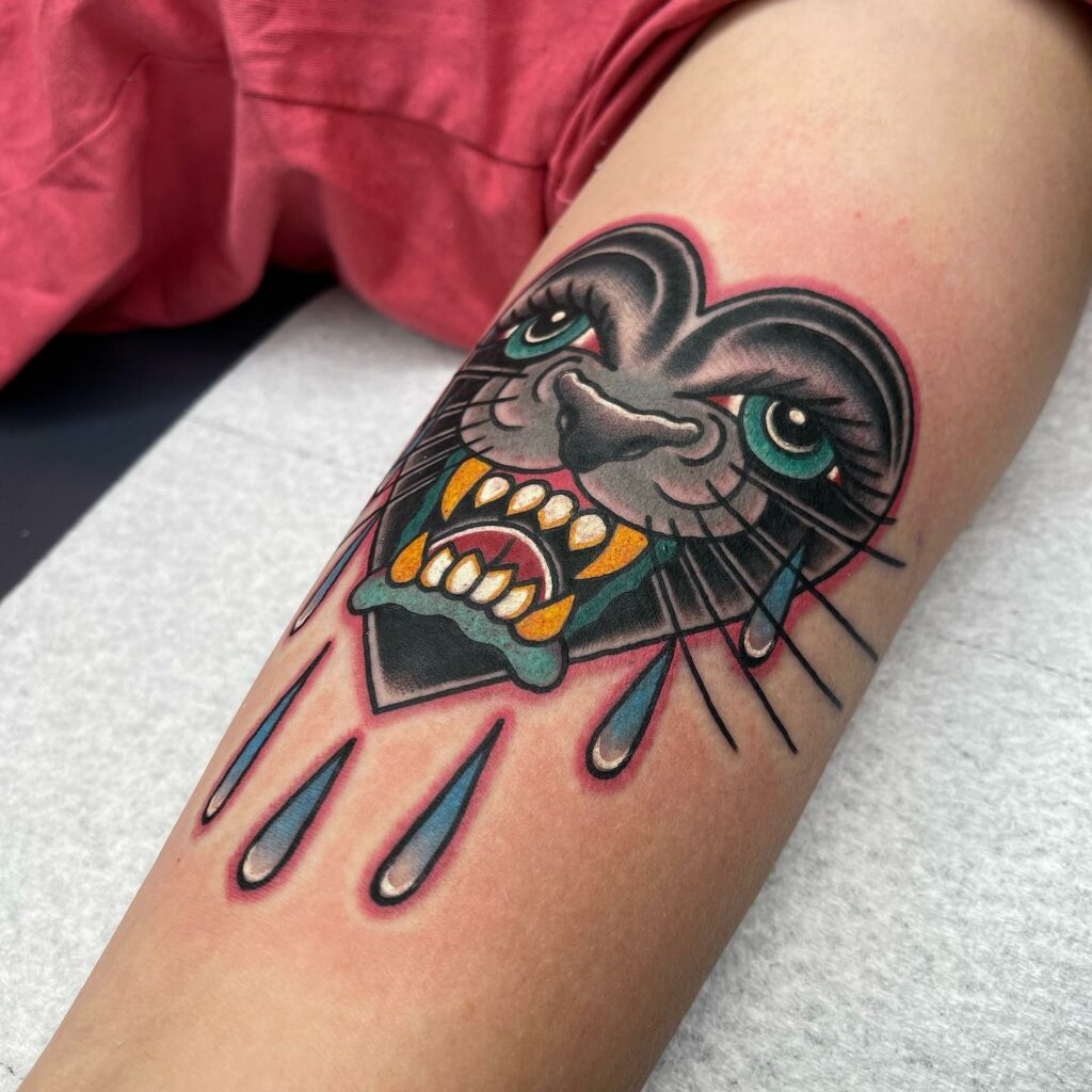 10+ Traditional Panther Head Tattoo That Will Blow Your Mind! 12 Crying Heart Black Traditional Panther Tattoos
