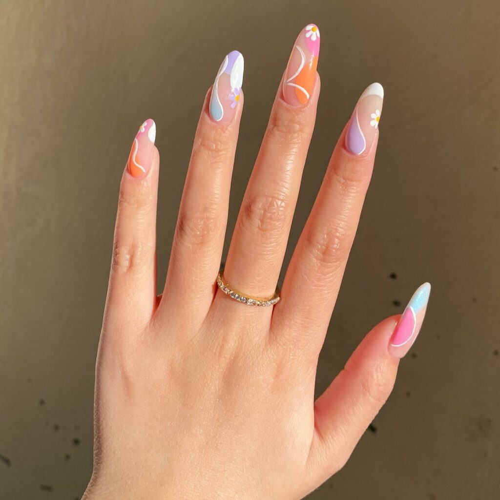50 Latest Almond Shape Nail Ideas To Try In 2024! 42 Abstract Almond Nails with Florals
