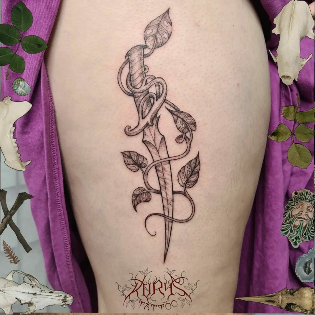 10+ Vine Flower Tattoo Ideas That Will Blow Your Mind! 16 Dagger Flower Vine Tattoo