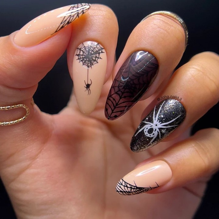 Get Spooky with 33 Black Halloween Nails To Try in 2024 33 Dark spider web nails