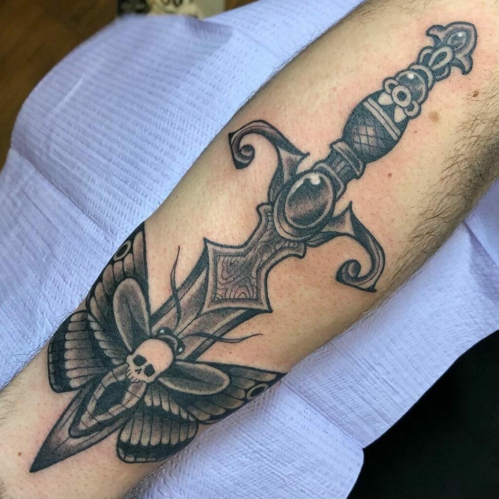 12+ Death Moth Tattoo Ideas To Inspire You! 14 Death's Head Moth With A Dagger Tattoo