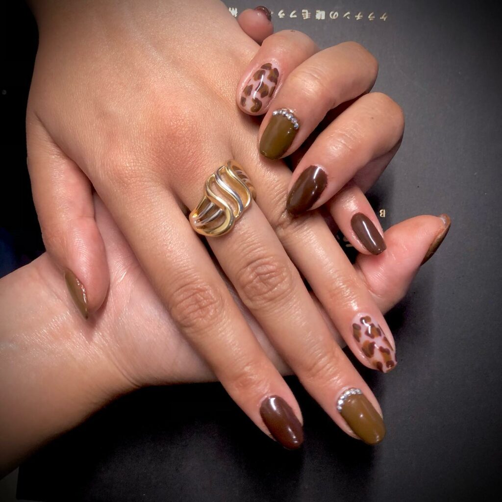 Fall in Love with 57 Short Fall Nail Designs in 2024 33 Brown Short Fall Nails with Animal Prints