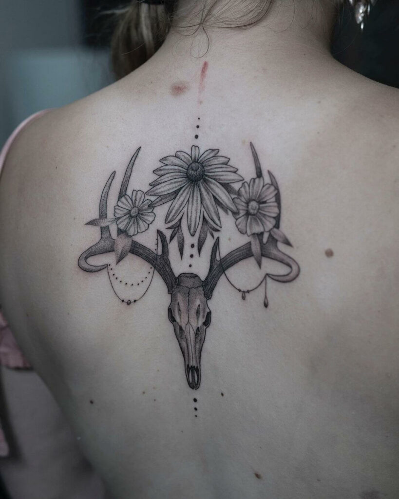 11 Latest Antler Tattoos To Inspire You In 2024! 19 Deer Skull with Antlers and Flowers Tattoo