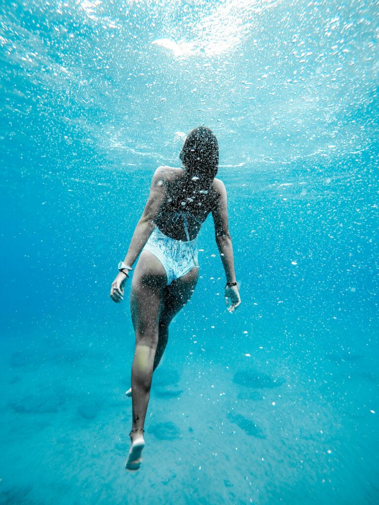Do You Tan Faster In Water or Laying Out - Get The Facts In 2024 11 Diving Deep The Benefits of Underwater Tanning