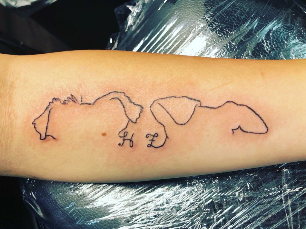 10+ Dog Ear Tattoo Ideas That Will Blow Your Mind! 17 Dog Ear With Initials Tattoo