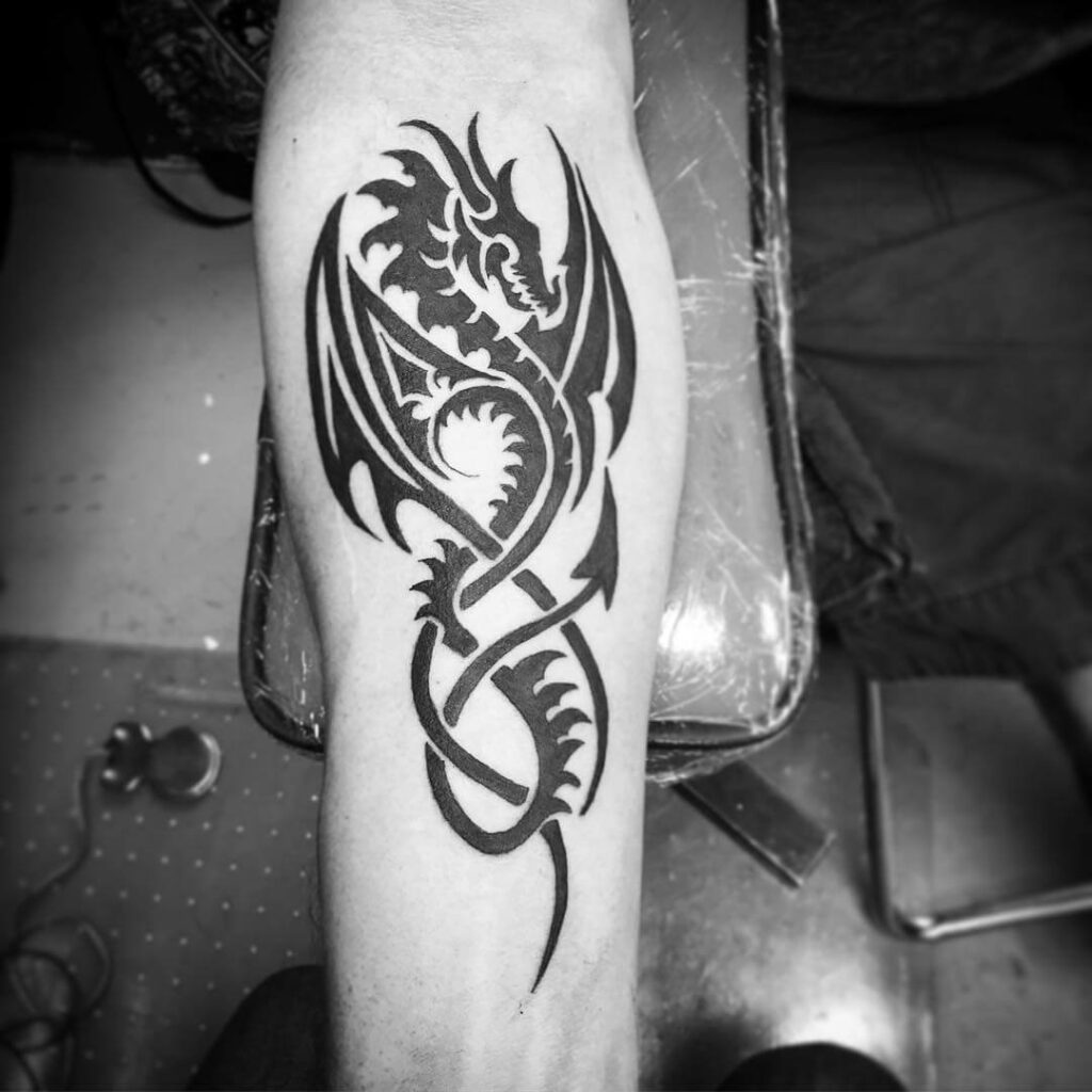 11+ Tribal Dragon Tattoo Ideas You Have To See To Believe! 15 Dragon Tattoo In Celtic Cultures