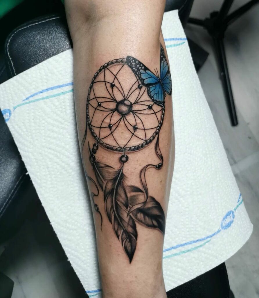 13+ Thigh Unique Dream Catcher Tattoo Ideas That Will Blow Your Mind! 19 Dream Catcher Tattoo With Blue Butterfly