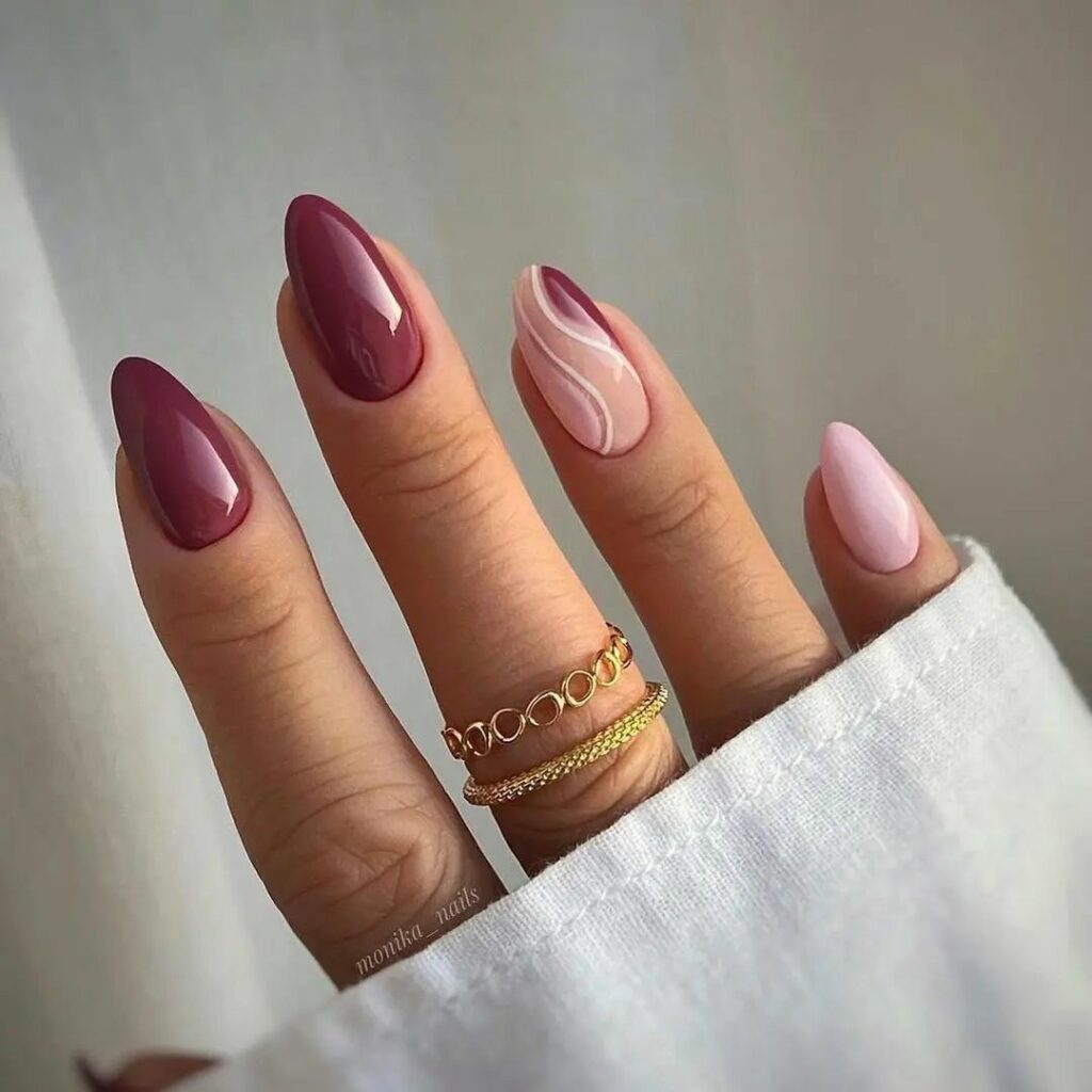 27 Latest Maroon Nail Designs To Try In 2024! 26 Elegant Swirl Maroon Nails