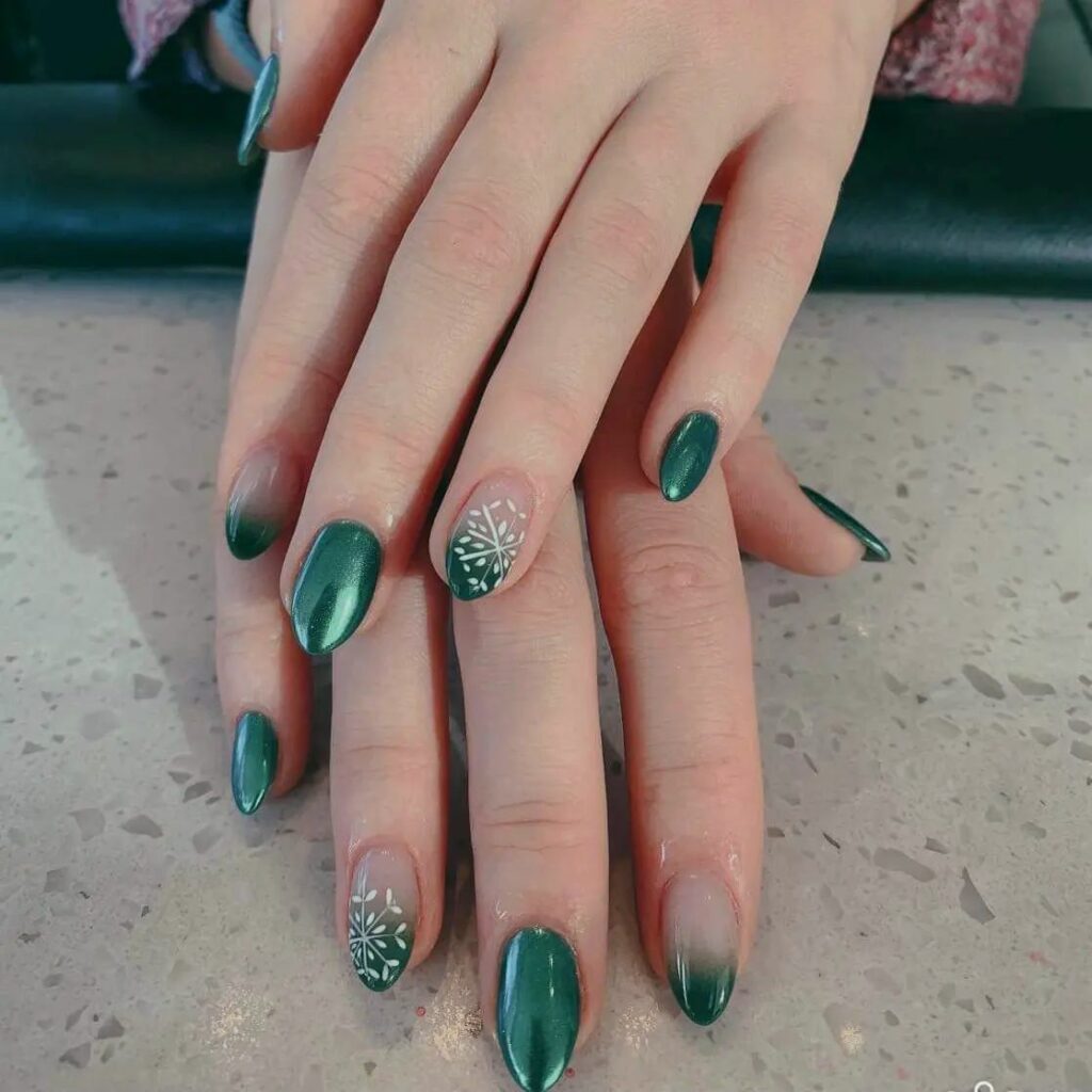 Get Festive with 25 Green Christmas Nail Ideas in 2024 24 Shimmering Emerald Green Christmas Nails