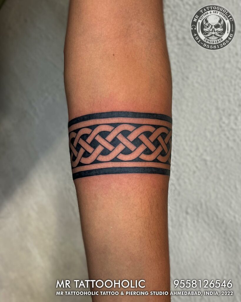 10+ Meaning Celtic Tattoos That Will Blow Your Mind! 14 Fantastic Celtic Knot Arm Band Tattoo Ideas