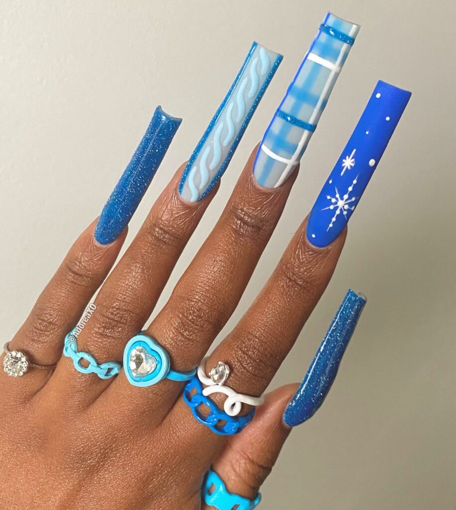 Feel Festive with 30 Blue Christmas Nail Ideas in 2024 22 Festive Elegance with a Splash of Sparkle