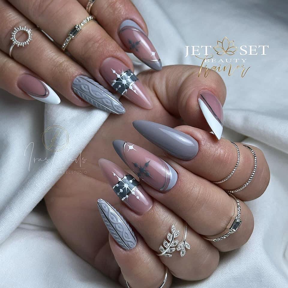 Get Cozy with 20 Grey Christmas Nail Ideas in 2024 23 Festive Matte Grey Christmas Nails with Holly Accents