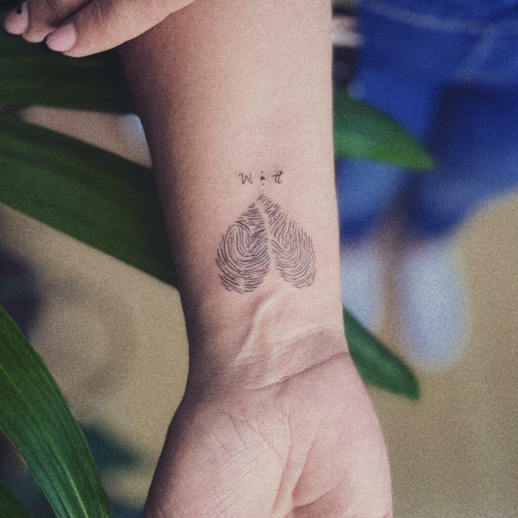 11+ Wrist Heart Tattoo Ideas That Will Blow Your Mind! 13 Fingerprint Classy Heart Tattoo On Wrist