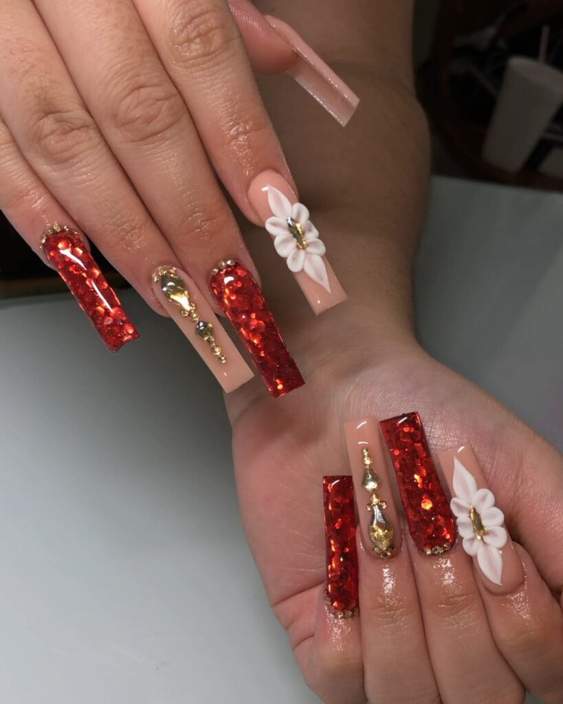 34 Latest Red and Gold Nail Designs To Try In 2024! 18 Floral Accents on Red and Gold Acrylic Nail