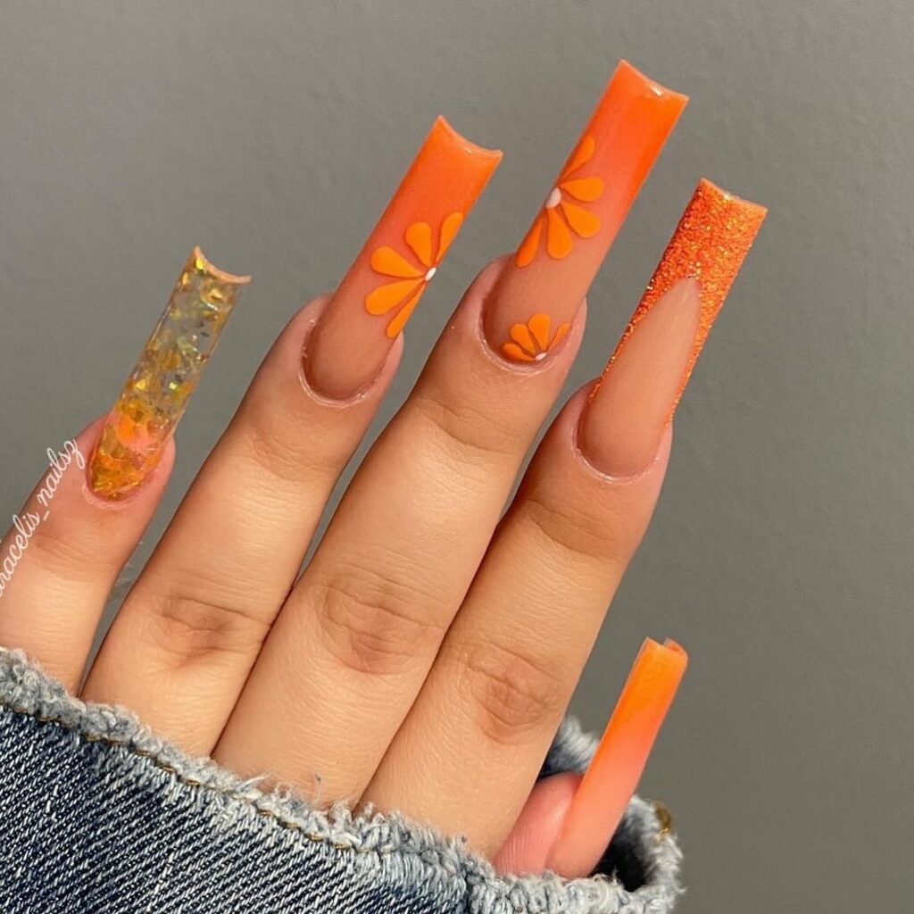 33 Latest Orange Acrylic Nail Ideas To Try in 2024! 24 Blossom-Embellished Orange Acrylic Nails