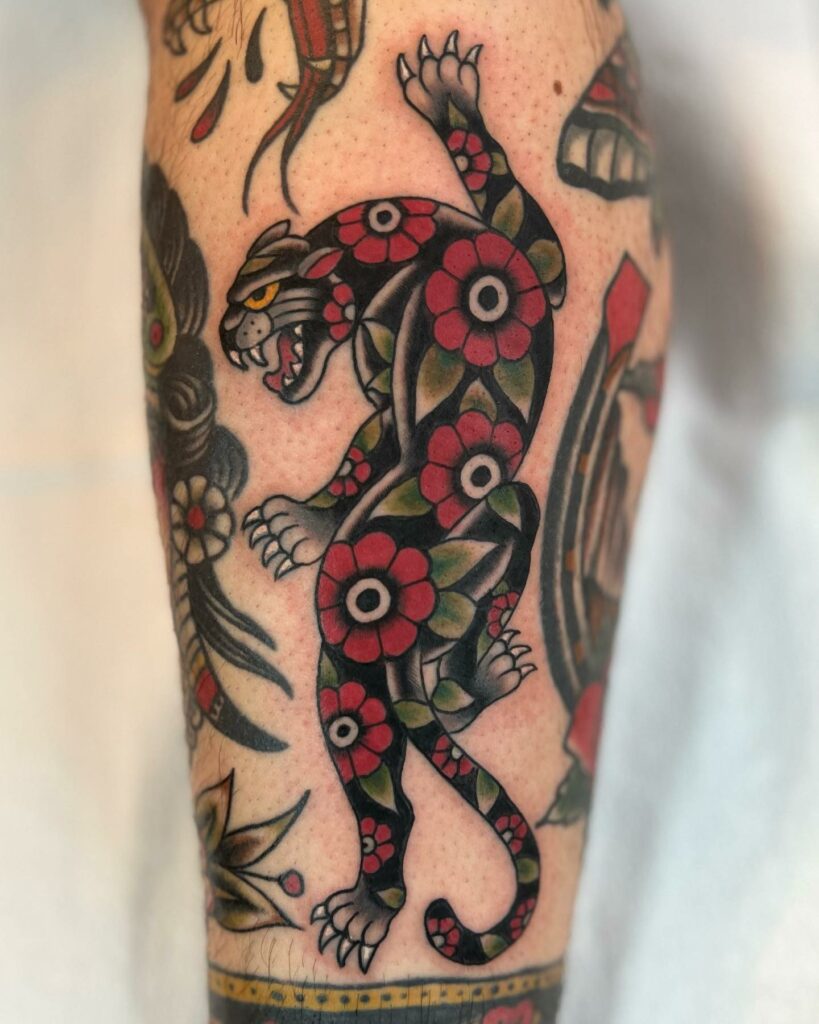 10+ Traditional Panther Head Tattoo That Will Blow Your Mind! 14 Floral Camouflage Traditional Crawling Panther Tattoo Designs