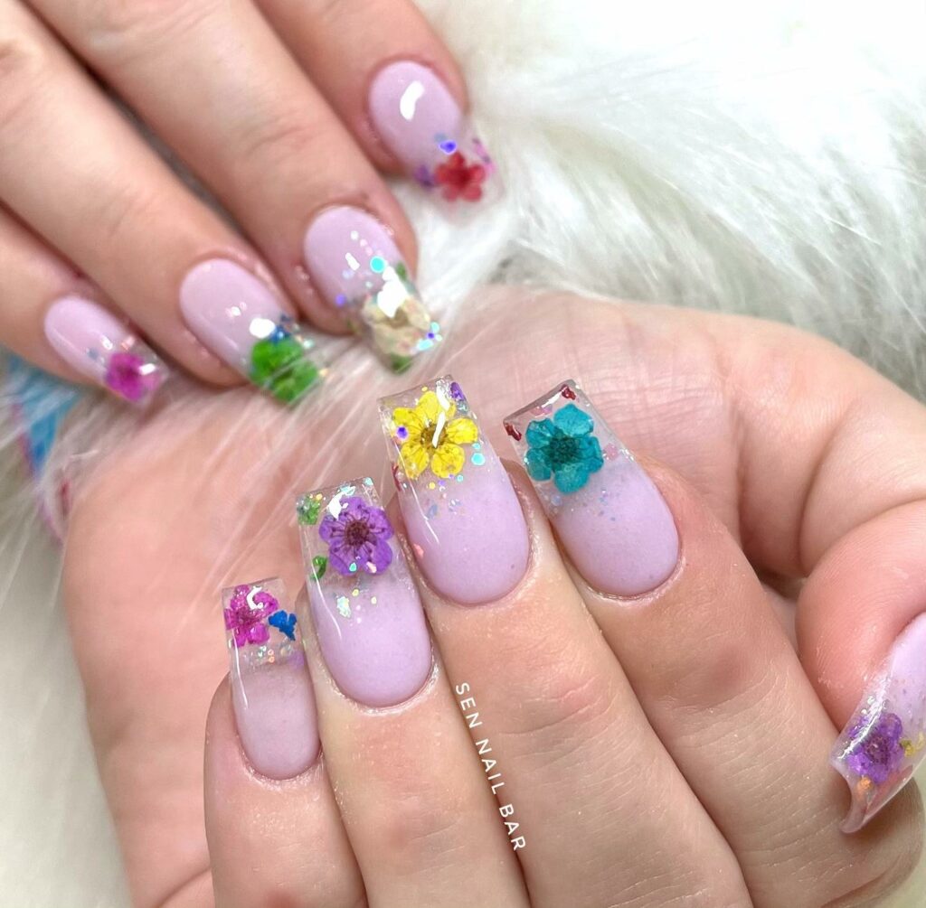 Discover the Hottest Designs of 2024: 30 Latest Dip Powder Nails 28 Floral Dip Powder Nails