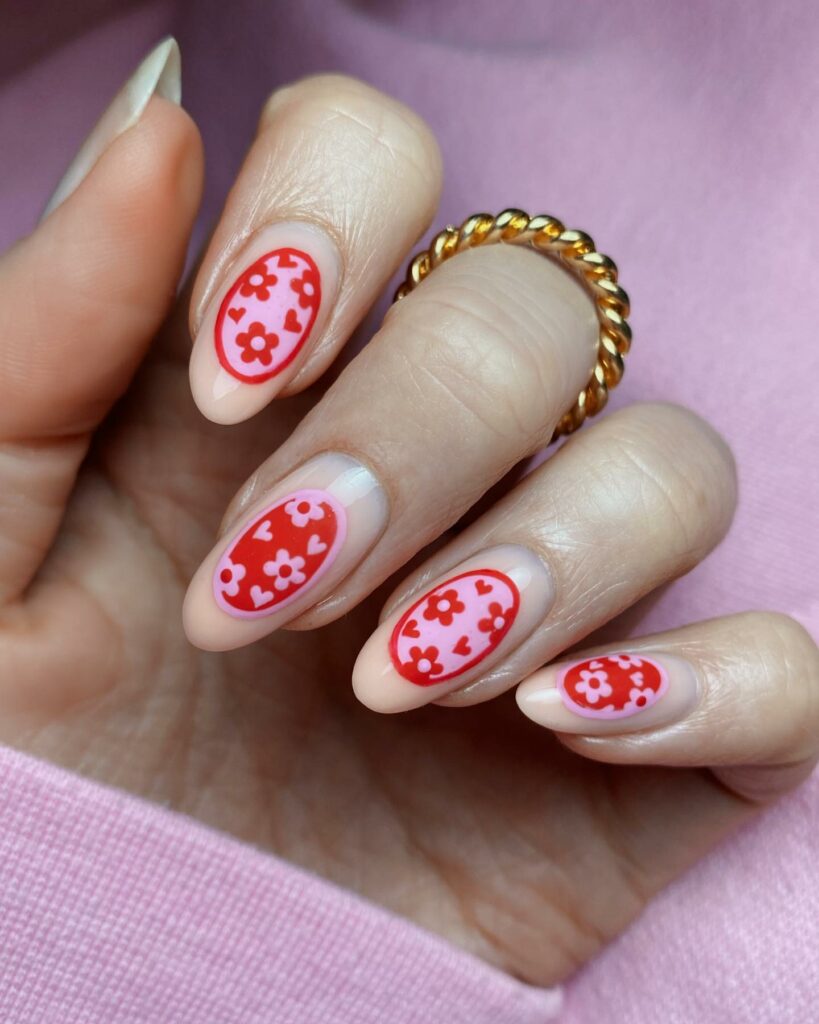37 Latest Red And Pink Nail Design Ideas To Try In 2024! 31 Floral Finesse in Pink and Red Nails