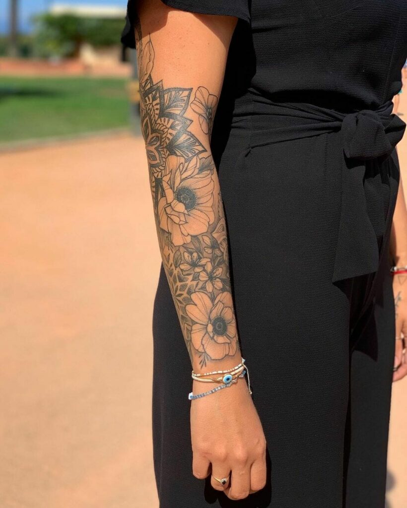 10+ Forearm Sleeve Tattoo Ideas You Have To See To Believe! 11 Floral Outer Forearm Sleeve Tattoo