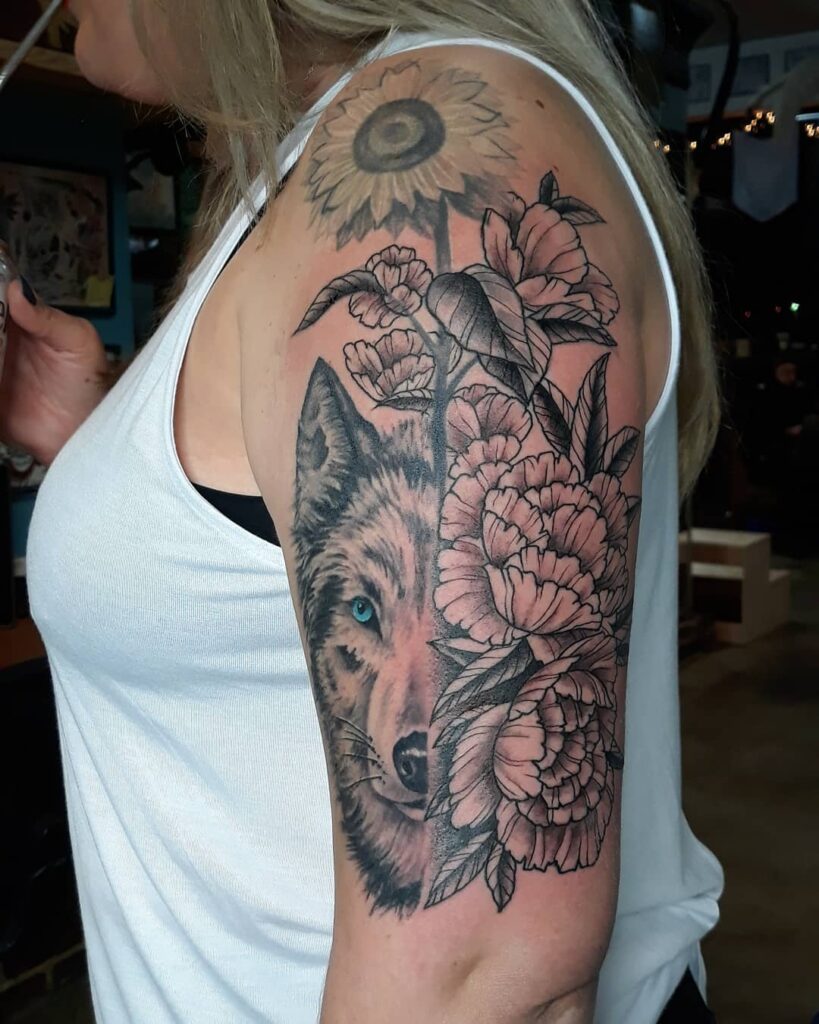 12+ Wolf Face Tattoo Ideas To Inspire You! 15 Floral Wolf Shoulder Tattoo Idea
