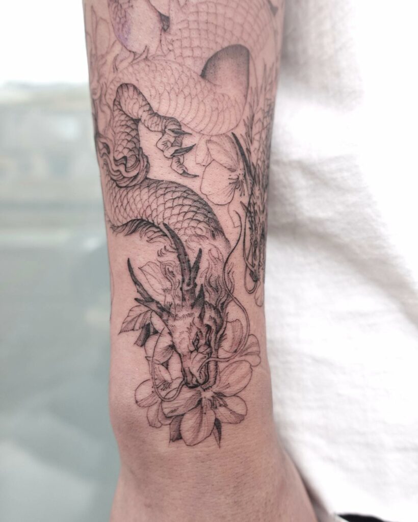 11+ Western Dragon Tattoo Ideas That Will Blow Your Mind! 16 Flower Flourish Dragon Tattoo