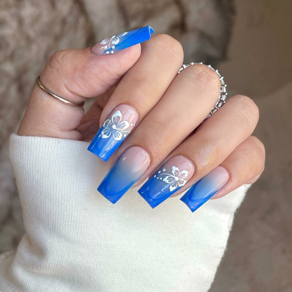 Experiment with 30 Stunning Blue Ombré Nails for 2024 36 Flower blue ombre nails