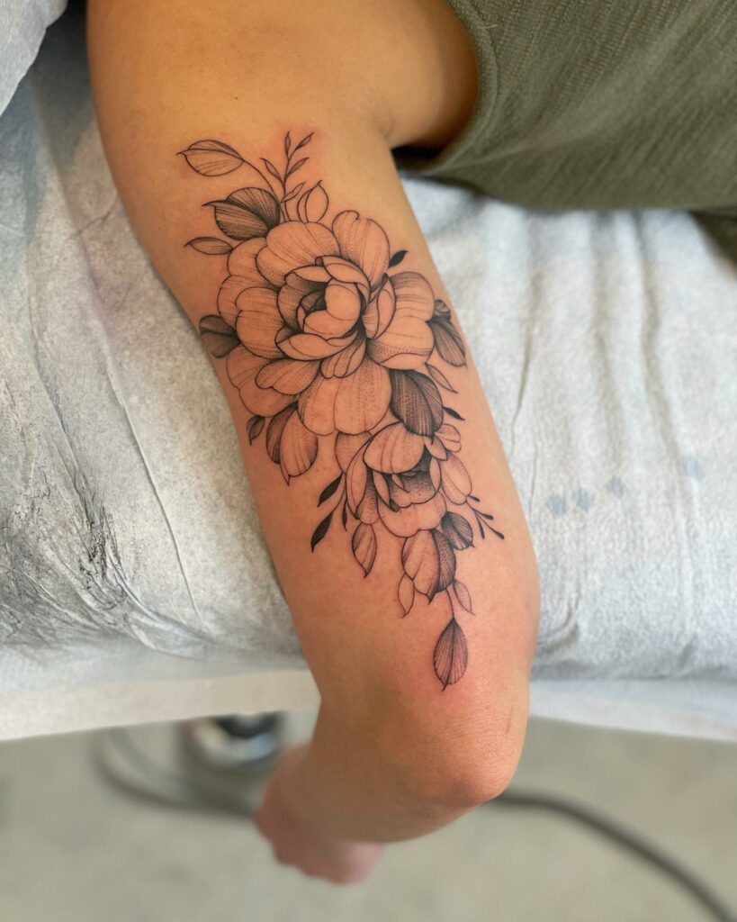 11+ Back Of Bicep Tattoo Ideas That Will Blow Your Mind! 18 Flowers Back Of Arm Tattoos