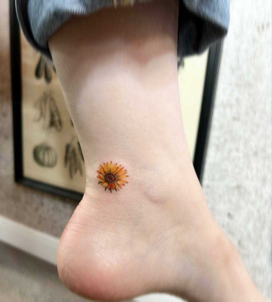 10+ Sunflower And Butterfly Tattoo Ideas That Will Blow Your Mind! 18 Foot Sunflower Tattoos
