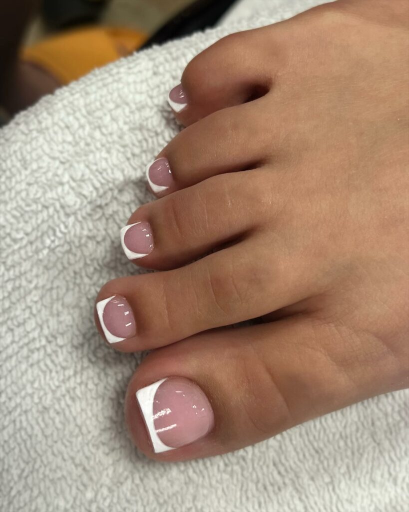 20 Latest Acrylic Pedicure Ideas To Try In 2024! 11 French White Acrylic Pedicure