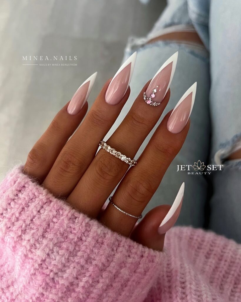 Get Festive with 20 Stiletto Christmas Nail Ideas in 2024 20 French White Stiletto Christmas Nails