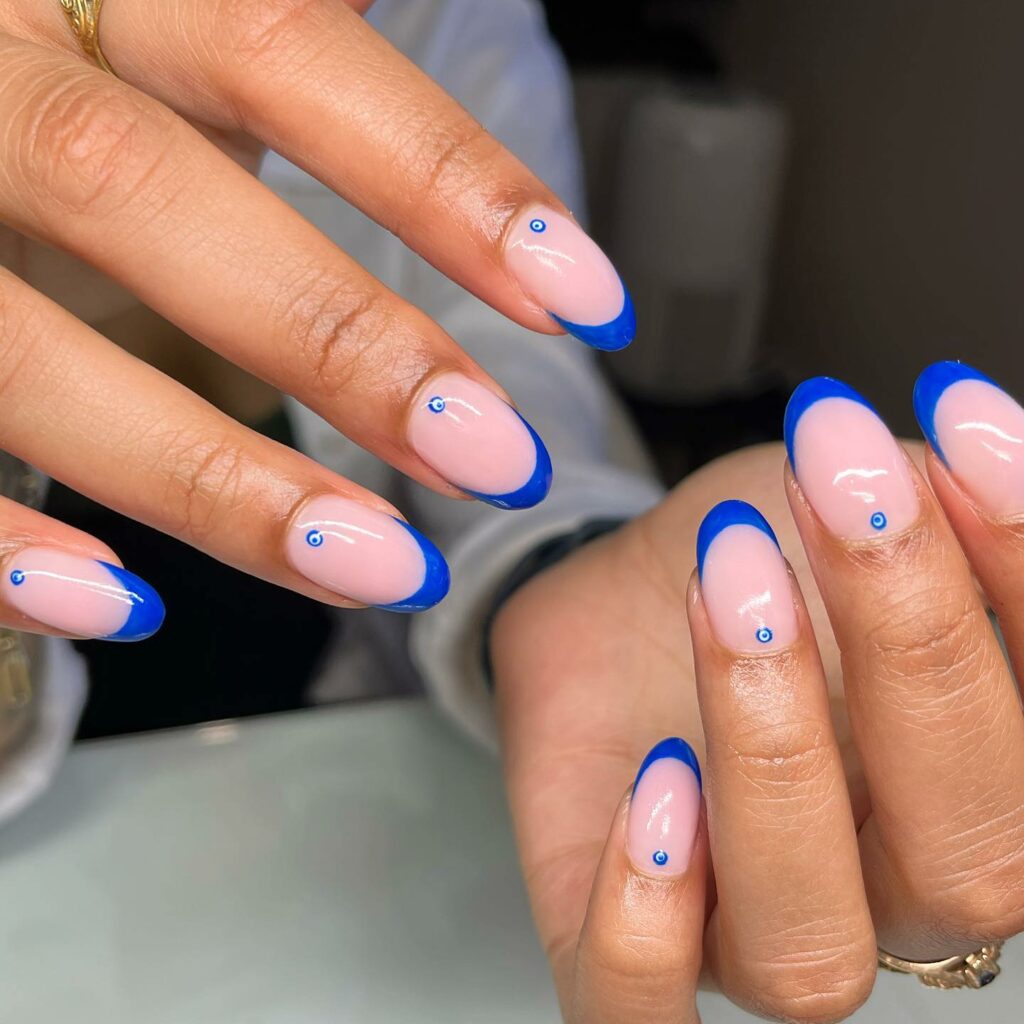 Channel Mystique with 20 Evil-Eye Nail Designs for 2024 16 French evil eye nails