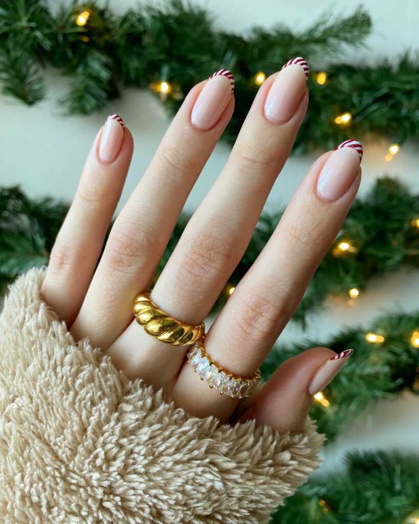 Enjoy 20 Candy Cane Nail Designs in 2024 15 Refined Candy Cane Stripes on French Manicure
