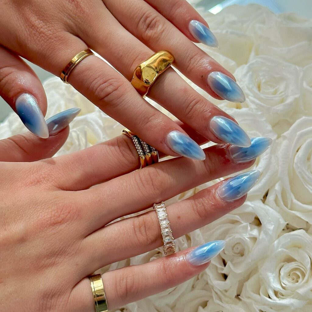 Experiment with 30 Stunning Blue Ombré Nails for 2024 35 Frosted blue ombre nails
