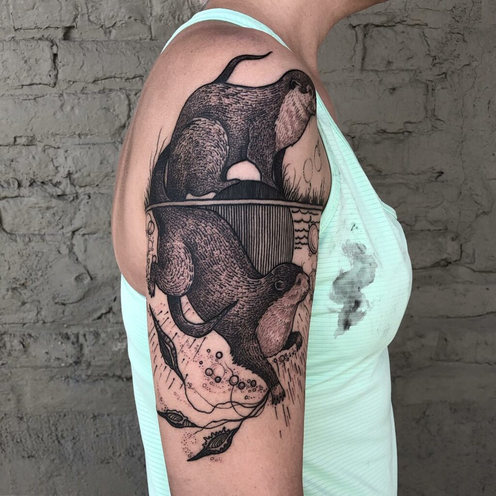 10+ Sea Otter Tattoo Ideas That Will Blow Your Mind! 18 Full Arm Twin Clawed Otter Tattoo