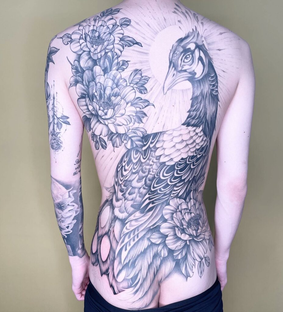 12+ Peacock Tattoo On Back Ideas To Inspire You! 11 Full Back Peacock Tattoo