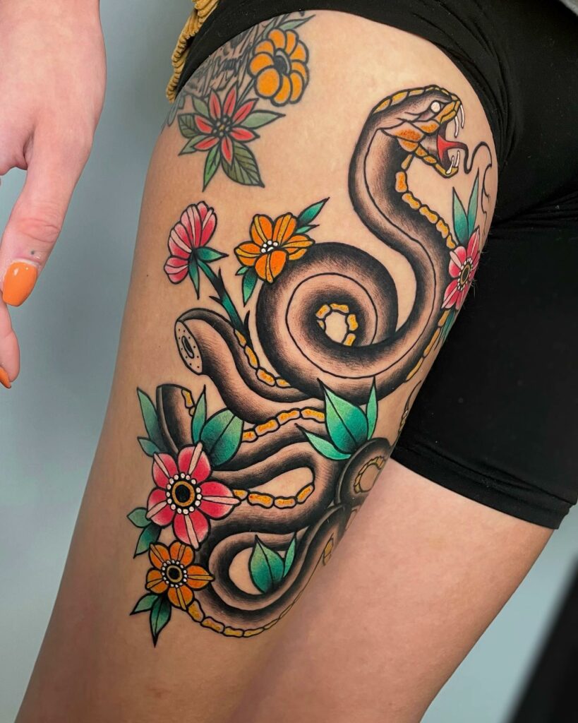 12+ Snake Thigh Tattoo Ideas To Inspire You! 18 Full Thigh Snake Tattoo With Colorful Flowers