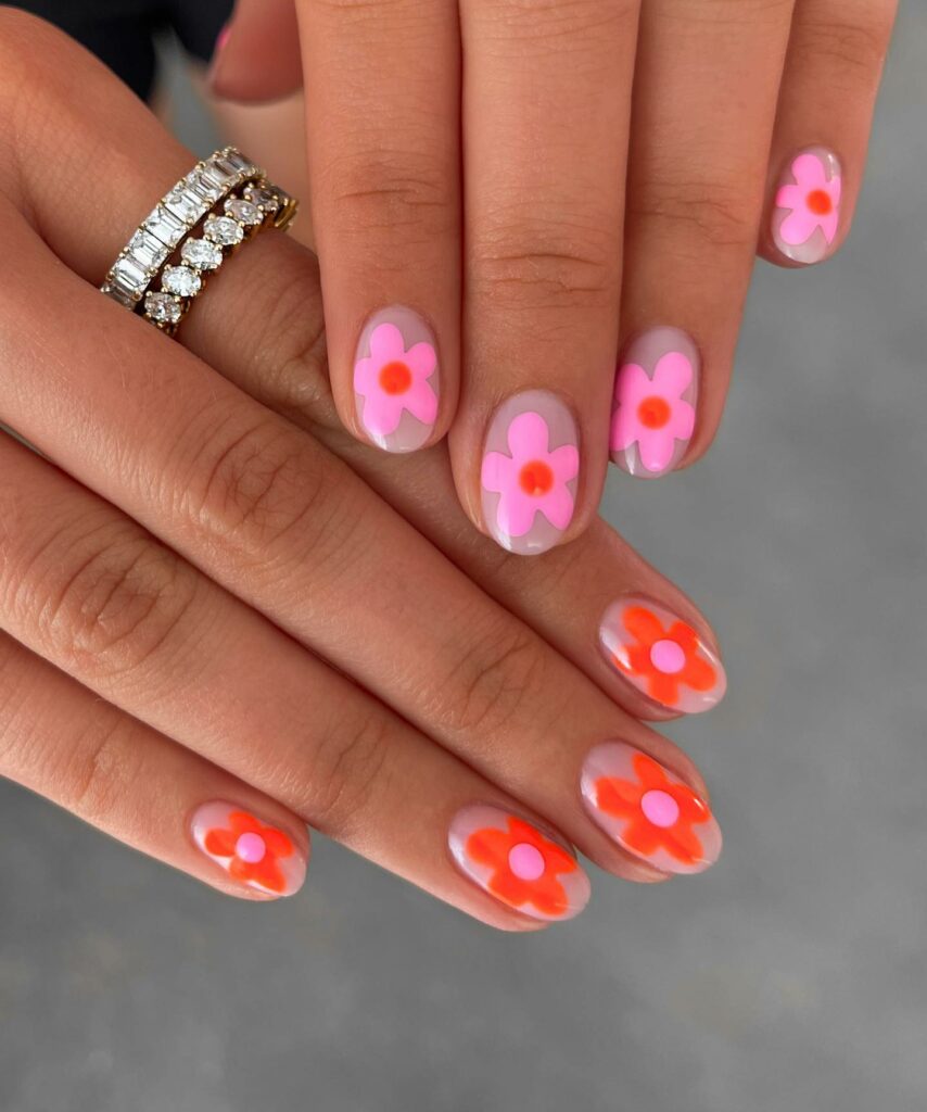 30 Latest Round Nail Designs To Try In 2024! 33 Vibrant Funky Flowers on Round Nails