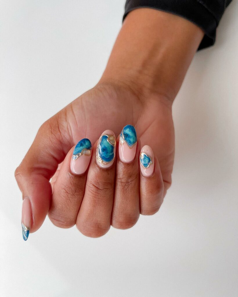 30 Latest Round Nail Designs To Try In 2024! 30 Geode-Inspired Textures for Mystical Round Nails