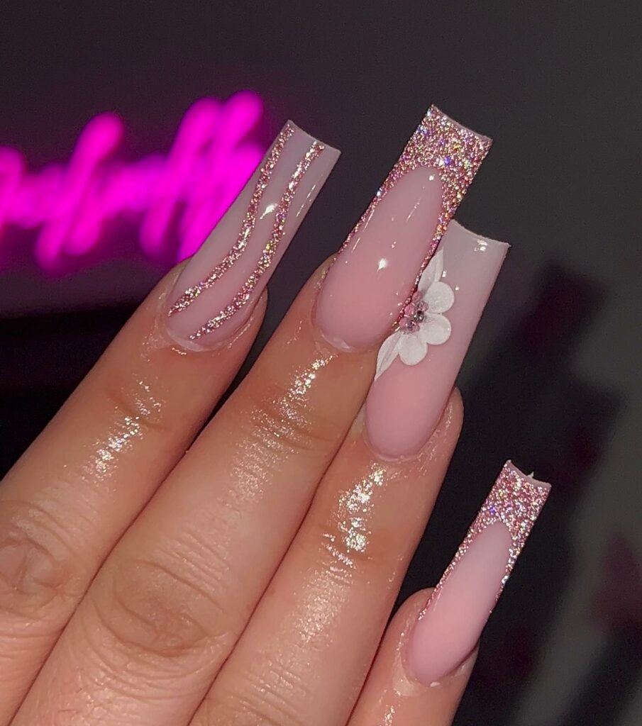 40 Latest Nude Pink Nail Ideas To Try In 2024! 24 Glitter-Infused Nude Pink Acrylic Nails