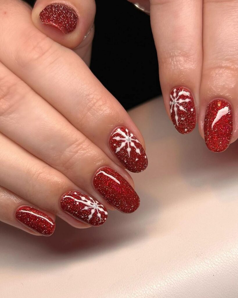 Celebrate with 40 Christmas Statement Nail Designs in 2024 14 Sparkling Ruby Snowflake Nails