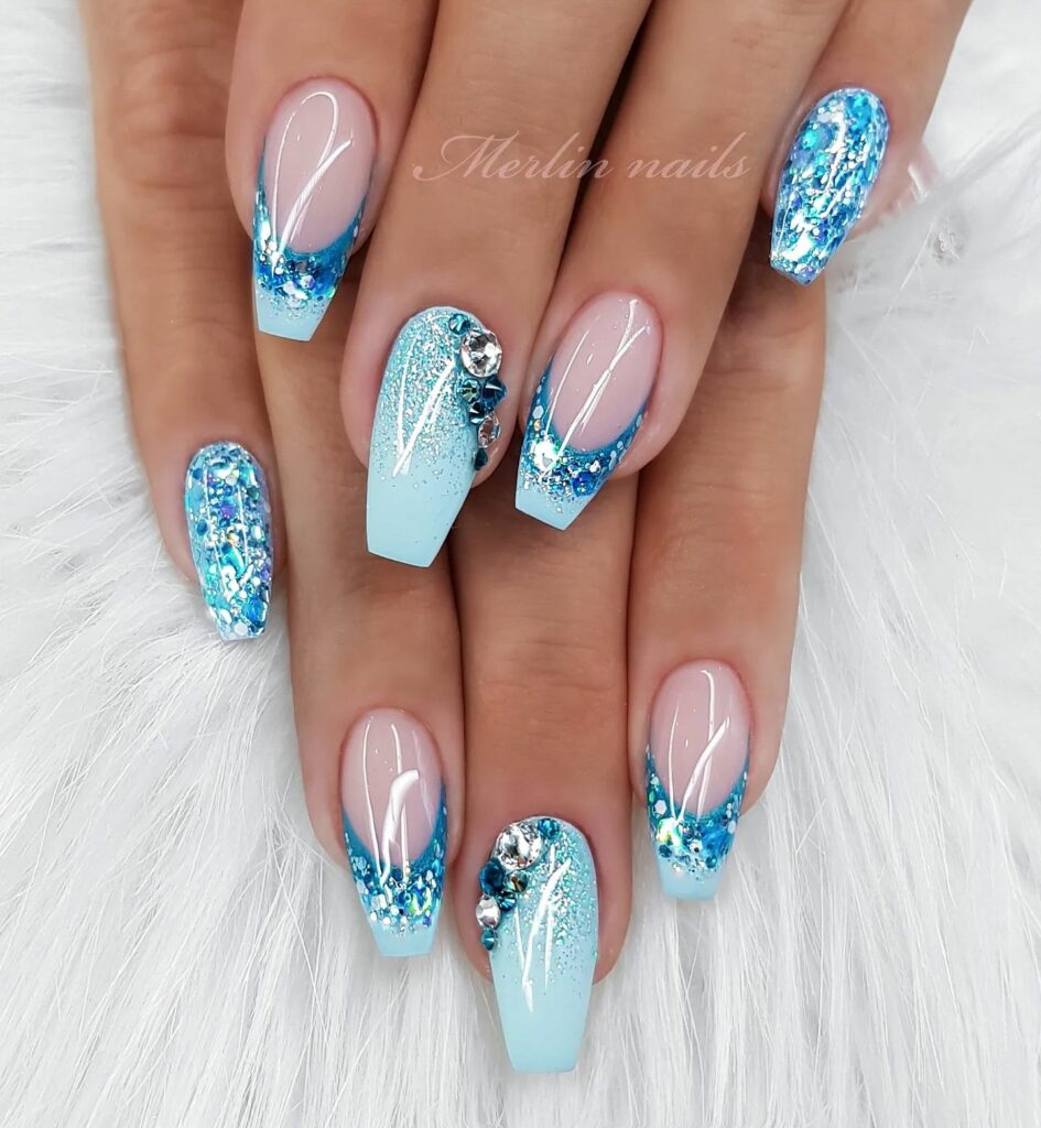 20 Latest Cinderella Nail Ideas To Try In 2024! 10 Glittery Blue Cinderella-Inspired Nails