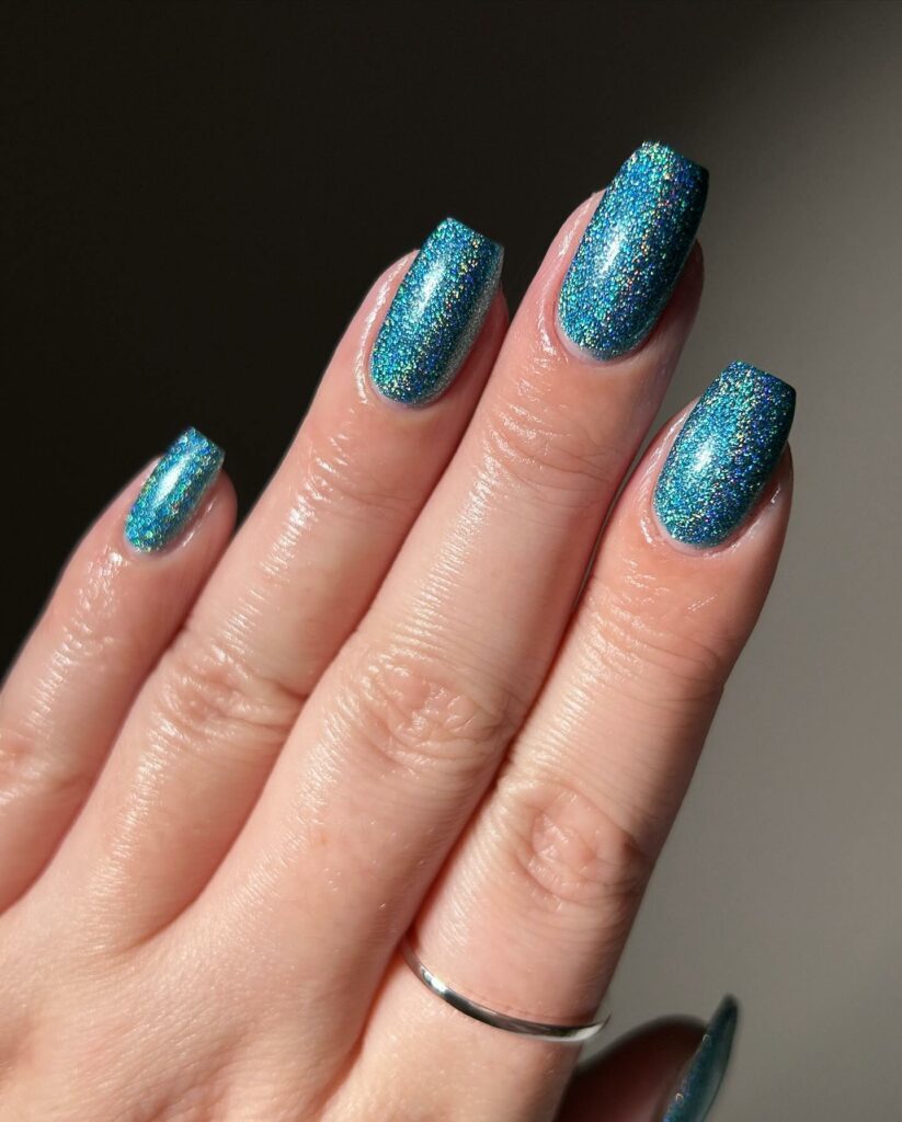 25 Latest Frozen Nail Designs To Try In 2024! 22 Glittery Icy Blue Frozen Inspired Nails