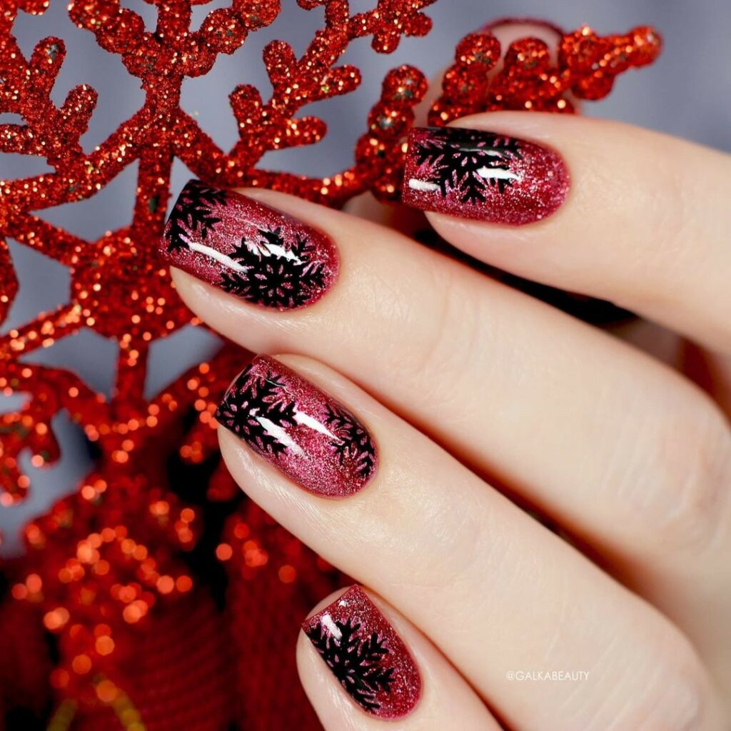 44 Latest Snowflake Nail Ideas To Try In 2024! 44 Lustrous Ruby with Snowflake Motifs Nails